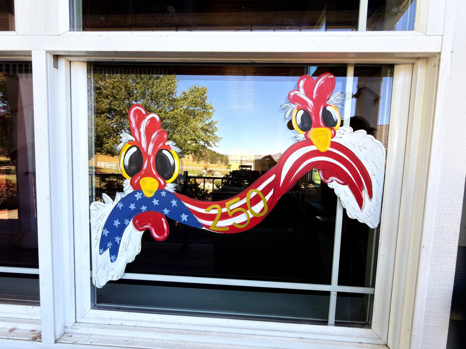 Patriotic rooster window painting by Katie Paige Art Co